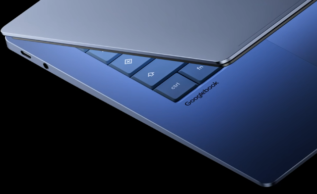 An artistic render of the new Googlebook laptop with the Gemini logo.